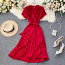 Knee-Length Solid V-Neck Pleated Dress