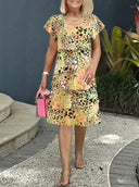 Chic Ruffled Maxi Dress with Intricate Pattern Design