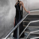Chic Evening Dress with Deep V-Neck and Flowy Slit
