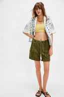 Chic Lace Top with Playful Ruffle Design