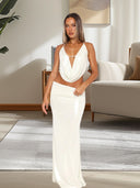 Stunning Evening Dress with Deep Neckline and Shimmering Detailing