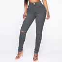 Trendy High-Waist Jeans with Chic Distressed Design