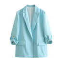 Chic Blazer Jacket with Structured Sleeves and Gold Accents