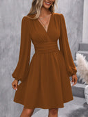 Chic Knee-Length Wrap Dress with Stylish Puff Sleeves