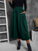 Chic Midi Skirt with Elastic Waist and Pocket Design