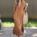 Chic V-Neck Midi Dress with Side Pockets