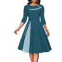 Chic Midi Dress with Dots & Contrast Trim