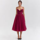 Chic Cocktail Dress with Adjustable Straps and Shimmering Overlay