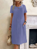 Chic Midi Dress with Pleats and Handy Pockets