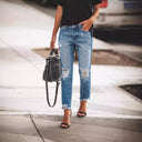 Stylish Women's Distressed Jeans for Trendy Looks