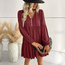 Chic Women's Dress with Button Accents and Billowing Sleeves