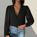 Chic Bodysuit with Statement Sleeves and V-Neck Design