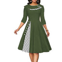 Chic Midi Dress with Dots & Contrast Trim