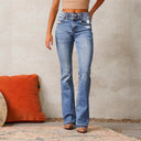 High-Waisted Women's Flared Jeans with Chic Distressed Style