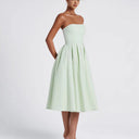 Chic Midi Dress with Flowy Skirt and Bandeau Neckline