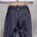 Chic Black Pleated Harem Trousers