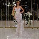 Stunning Evening Dress with Sequined Detail and Sheer Overlay