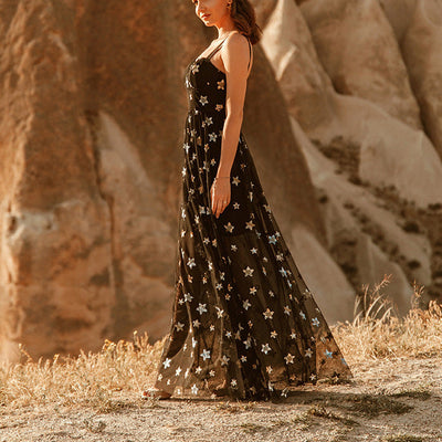 Chic Evening Dress with Star Appliqués in Sheer Fabric