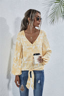 V-Neck Blouse with Playful Knot Detail
