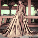Stunning Evening Gown with Deep V-Neck and Flowing Train