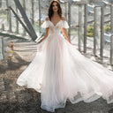 Chic Wedding Dress with Sheer Puff Sleeves and Glittering Bodice