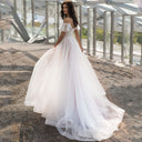 Chic Wedding Dress with Sheer Puff Sleeves and Glittering Bodice
