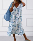 Chic Midi Dress with Leaf Print Design