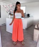 Vibrant Neon Orange Trousers for Bold Style