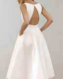 Minimalist White Wedding Dress with Deep V-Neck and Pockets