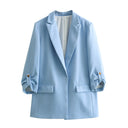 Chic Blazer Jacket with Structured Sleeves and Gold Accents