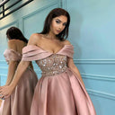 Chic Evening Dress with Shimmering Top and Flutter Sleeves