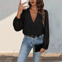 Chic Bodysuit with Statement Sleeves and V-Neck Design