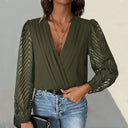 Chic Bodysuit with Statement Sleeves and V-Neck Design