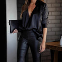 Chic Silk Blouse with Deep V-Neck & Drop-Shoulder Design