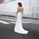 Chic High Slit Evening Gown with Sheer Top and Pearl Accents