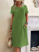 Chic Midi Dress with Pleats and Handy Pockets