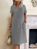 Chic Midi Dress with Pleats and Handy Pockets