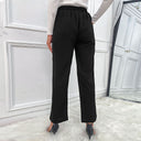 Chic High-Waisted Trousers with Trendy Button Accents