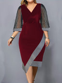 Chic Cocktail Dress with Sheer Puff Sleeves & Asymmetrical Hem