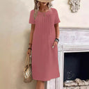 Chic Midi Dress with Pleats and Handy Pockets