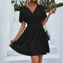 Shimmering V-Neck Mini Dress with Voluminous Sleeves