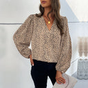 Chic Leopard Print Blouse with Statement Sleeves