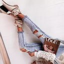 Distressed Women's Boyfriend Jeans with High Waist Design