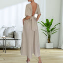Stylish Midi Dress with Deep Back and Bow Detail