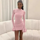 Chic Mini Dress with Statement Sleeves and Ruching Details