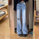 Stylish High-Waisted Flared Jeans with Ripped Accents