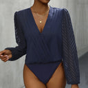 Chic Bodysuit with Statement Sleeves and V-Neck Design