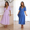 Chic Maxi Dress with Deep V-Neck and Flowy Skirt