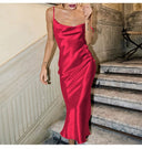 Stylish Satin Midi Dress with Spaghetti Straps and Flowing Design