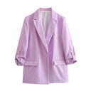 Chic Blazer Jacket with Structured Sleeves and Gold Accents